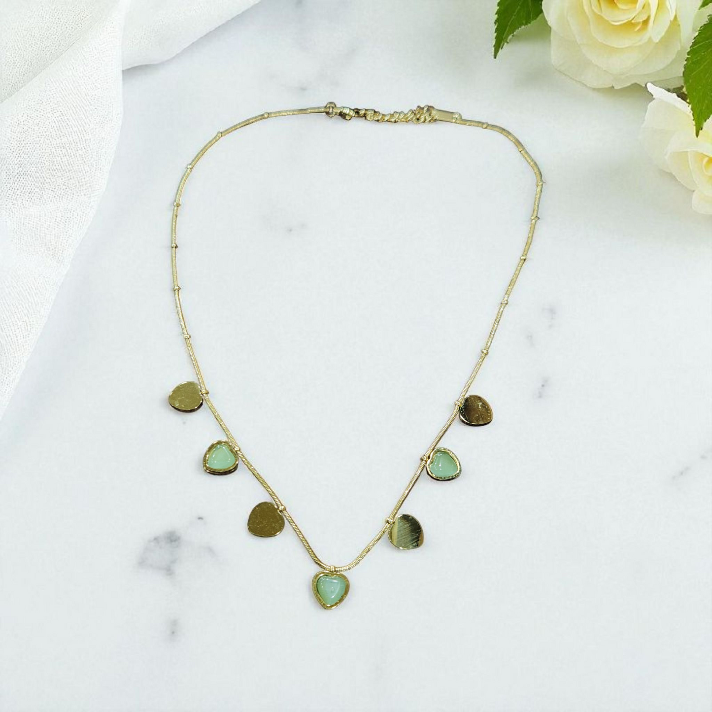 Anti tarnish Charm Necklace with Heart Shaped Green Stone Accents