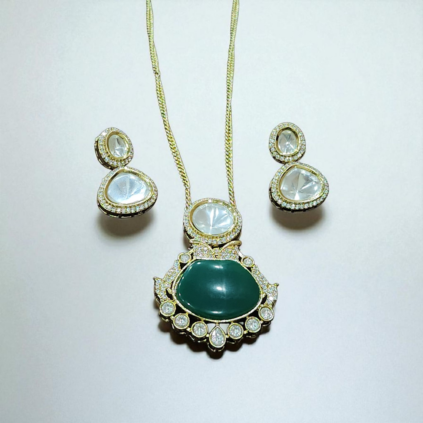 Gold Polish Pendant Necklace Set with Green Stone & Kundan AD Accents