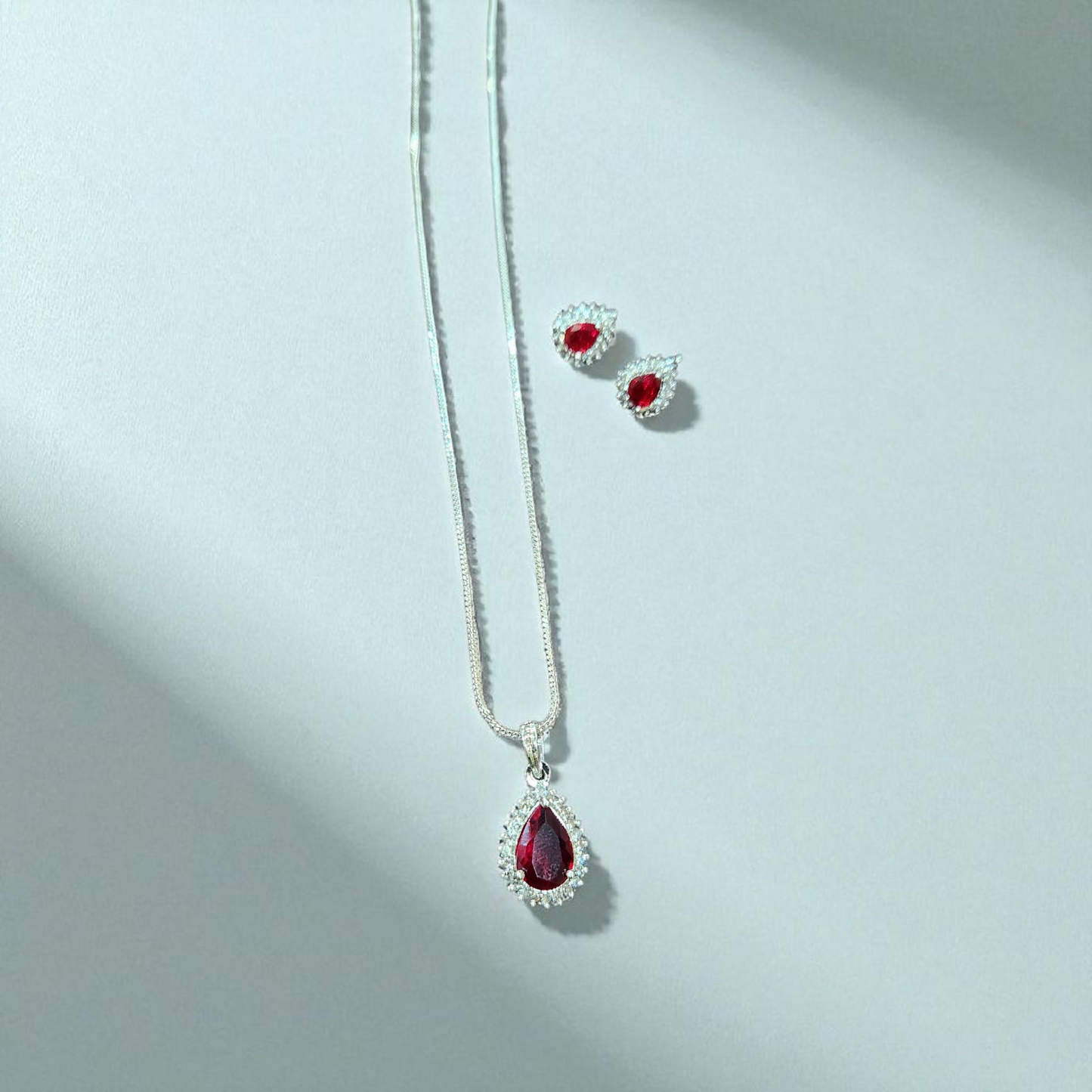 Teardrop Ruby Red AD Pendant Set with Earrings – Elegant Silver Finish
