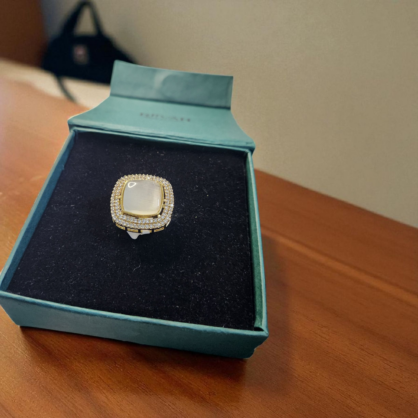Gold Polished Statement Ring with Moon Stone & AD Accents